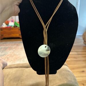 Elegant Brown Necklace with Silver Pendant